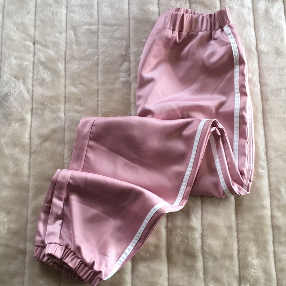 By the way double stripped track pants